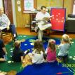 Dr. Dobash reads at preschool stortyime, 4/28/11